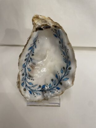 Oester taak met blaadjes